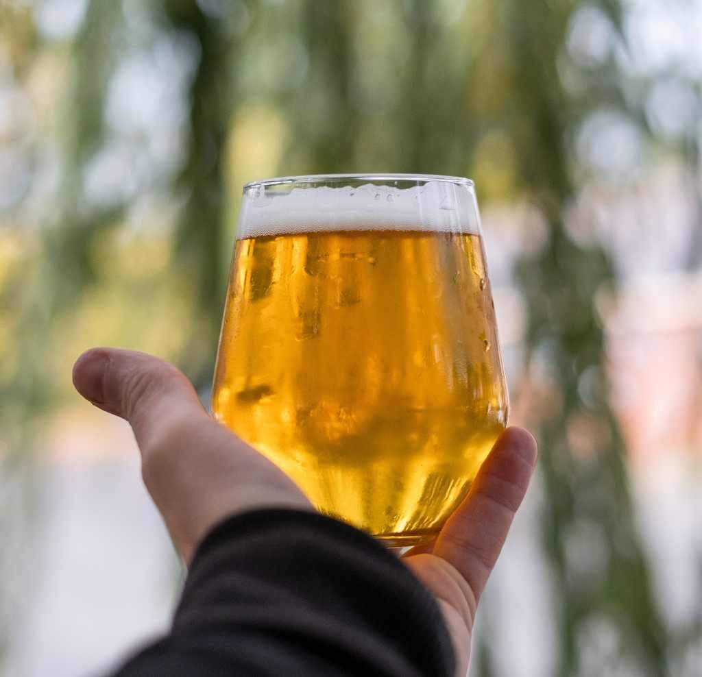 martin dixon alcohol free beer judge and writer holding a glass of beer in one hand